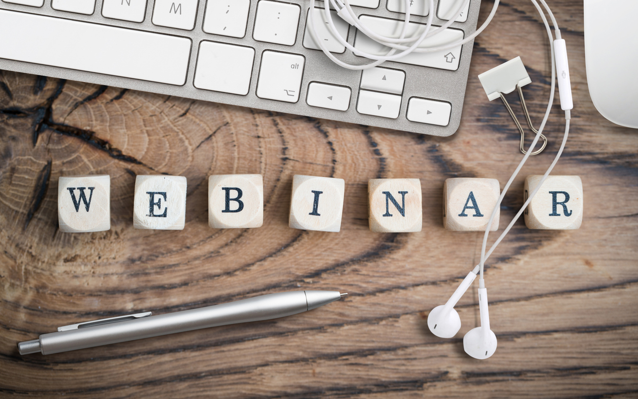 cubes with word “webinar” on wooden background